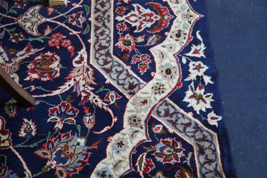 A Tabriz blue ground carpet, 410 x 272cm